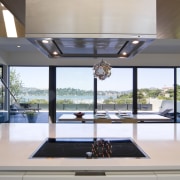 View of kitchen designed by Tim Rempel of architecture, daylighting, glass, house, interior design, real estate, window, gray