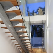 View of Home in Noosa by architects Resitsma architecture, daylighting, glass, handrail, house, interior design, stairs, gray