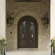 Castle Entries was contracted to provide a wrought arch, door, estate, iron, window, brown, white