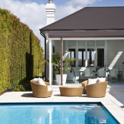 View of pool and garden designed by Humphreys cottage, estate, home, house, leisure, outdoor structure, property, real estate, resort, swimming pool, villa, water, teal