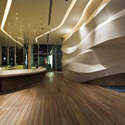 View of entrance area featuring wood flooring, bar architecture, ceiling, floor, flooring, hardwood, interior design, lighting, lobby, wood, wood flooring, brown