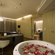 View of hotel suite featuring freestanding circular bathtub bathroom, ceiling, interior design, room, suite, brown