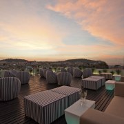 View of rooftop lounge. - View of rooftop evening, home, morning, real estate, sky, sunlight, sunset, gray, black