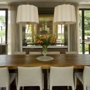 View of the dining area which feature twin chair, dining room, furniture, home, interior design, room, table, brown