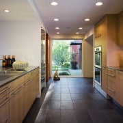 Inner view of the large kitchen with cabinetry cabinetry, ceiling, countertop, cuisine classique, estate, floor, flooring, home, interior design, kitchen, real estate, room, brown, gray