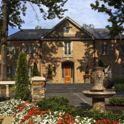 Exterior view of the front entrance way &amp; cottage, estate, facade, historic house, home, house, landscaping, manor house, mansion, medieval architecture, national trust for places of historic interest or natural beauty, property, real estate, stately home, villa, brown