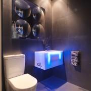 View of a themed bathroom with feature wall bathroom, ceiling, interior design, lighting, room, black