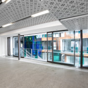 Anterior view of the Ironbank building which features architecture, daylighting, glass, lobby, gray