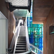 Interior view of the Ironbank building which features architecture, building, daylighting, glass, stairs, structure, tourist attraction, red