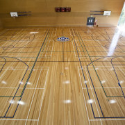Interior view of the gymnasium of the St basketball court, floor, flooring, hardwood, indoor games and sports, leisure centre, line, sport venue, sports, structure, wood, wood flooring, orange, brown