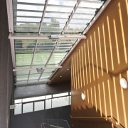 View of a stairway inside the St Kents' architecture, building, ceiling, daylighting, facade, handrail, line, roof, stairs, steel, structure, window, brown, white