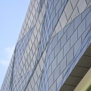 Exterior view of St Kents' Jubilee Sports Centre architecture, building, commercial building, condominium, corporate headquarters, daylighting, daytime, facade, headquarters, landmark, line, metropolis, metropolitan area, roof, sky, skyscraper, structure, tower block, urban area, gray, teal