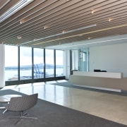 View of the new Deloitte premises which reflect architecture, ceiling, daylighting, floor, flooring, house, interior design, lobby, real estate, window, gray