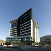 Building 4 in Coronation Drive Office Park, close architecture, building, commercial building, condominium, convention center, corporate headquarters, daytime, facade, headquarters, metropolis, metropolitan area, mixed use, real estate, sky, tower block, teal, black