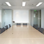 View of contemporary boardroom table from Wilkhan Pacific. ceiling, conference hall, floor, flooring, interior design, office, gray