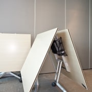View of contemporary boardroom table from Wilkhan Pacific. angle, chair, floor, furniture, light fixture, lighting, product, product design, table, gray