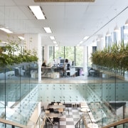 The offices of BNZ feature a combination of architecture, building, ceiling, condominium, daylighting, glass, interior design, lobby, mixed use, gray, white