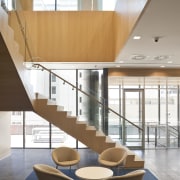 The offices of BNZ feature a combination of architecture, ceiling, daylighting, floor, furniture, glass, handrail, interior design, product design, stairs, table, white