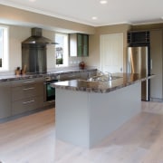 view of the kitchen in a house built cabinetry, countertop, cuisine classique, floor, flooring, hardwood, interior design, kitchen, property, real estate, room, wood flooring, gray