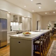 View of the kitchen of this house built cabinetry, ceiling, countertop, floor, flooring, hardwood, interior design, kitchen, laminate flooring, real estate, room, wood flooring, orange, brown