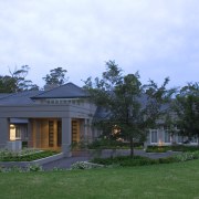 Exterior view of a country home designed and cottage, estate, facade, farmhouse, grass, home, house, landscape, mansion, plantation, property, real estate, residential area, roof, sky, villa, teal