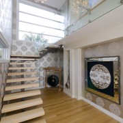 view of a stairway in this home designed ceiling, daylighting, floor, flooring, hardwood, home, interior design, living room, room, stairs, wood flooring, gray