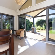 Interior view of David Reid show home dining architecture, ceiling, daylighting, estate, floor, flooring, hardwood, home, house, interior design, lobby, property, real estate, window, gray