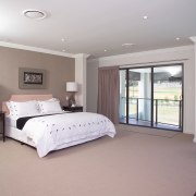 view of the master bedroom in a home bed frame, bedroom, ceiling, estate, floor, flooring, home, interior design, property, real estate, room, window, gray