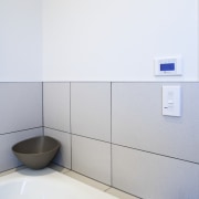 View of the touch-button keypad that controls the bathroom, bathroom sink, interior design, plumbing fixture, product, product design, sink, tap, white