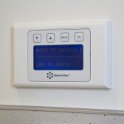 View of the touch-button keypad that controls the electronics, product design, technology, thermostat, gray