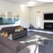 View of the lounge in a house built floor, home, house, interior design, living room, property, real estate, room, table, white, gray