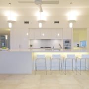 View of kitchen which features which features kitchen ceiling, countertop, daylighting, estate, floor, flooring, home, house, interior design, kitchen, property, real estate, room, gray