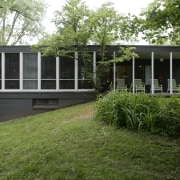 Exterior View of this home after decorating - architecture, backyard, cottage, farmhouse, grass, home, house, outdoor structure, porch, property, real estate, siding, yard, green