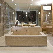 View of contemporary bathroom with mirror wall, white bathroom, floor, flooring, interior design, lobby, tile, brown, gray