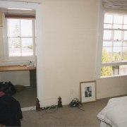 Interior view of bedroom - Interior view of bedroom, ceiling, door, floor, flooring, hardwood, home, house, interior design, living room, property, real estate, room, sash window, wall, window, window treatment, wood, gray