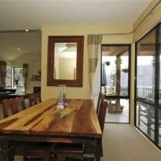 Overview of dining area with Timber Table - ceiling, dining room, floor, flooring, interior design, living room, property, real estate, room, window, brown