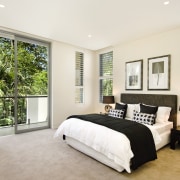 View of apartment with lounge opening out to bed frame, bedroom, ceiling, estate, floor, home, interior design, property, real estate, room, window, window covering, window treatment, white