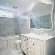 Bathroom showing marble &amp; French Provincial-style furnishings bathroom, bathroom accessory, bathroom cabinet, ceiling, floor, home, interior design, room, sink, tile, wall, window, gray, white