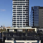 View of this contemporary apartment - View of apartment, architecture, building, city, commercial building, condominium, corporate headquarters, daytime, downtown, facade, headquarters, metropolis, metropolitan area, mixed use, real estate, residential area, sky, skyscraper, tower block, urban area, black, blue