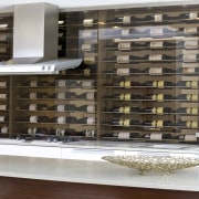 Close-up view of the kitchen's splash-back - Close-up bookcase, furniture, interior design, shelving, brown, gray