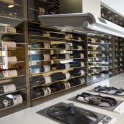 View of kitchen with cellar - View of retail, black, white