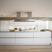 View of kitchen which features square stainless steel architecture, cabinetry, countertop, cuisine classique, floor, interior design, interior designer, kitchen, gray