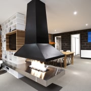 View of living area featuring steel trusses, shelving, architecture, interior design, product design, gray