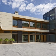 View of house with solid horizontal elements contrasted architecture, building, commercial building, condominium, corporate headquarters, elevation, estate, facade, home, house, property, real estate, residential area, gray