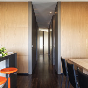 View of the hallway which has timber siding architecture, ceiling, floor, flooring, interior design, room, wood, orange