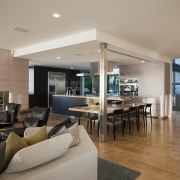 View of contemporary kitchen with lounge &amp; stairway apartment, ceiling, floor, interior design, living room, lobby, real estate, gray, brown