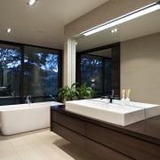 View of bathroom which features freestanding tub, cantilevered bathroom, estate, interior design, real estate, room, brown, gray