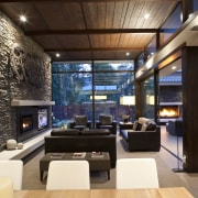 View of living space which features floor to interior design, living room, lobby, real estate, black