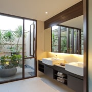 View of a renovated master suite with bathroom, door, interior design, real estate, window, gray