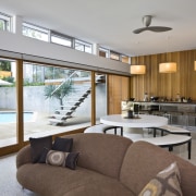 View of the poolside living area - View architecture, ceiling, house, interior design, living room, real estate, window, gray, brown